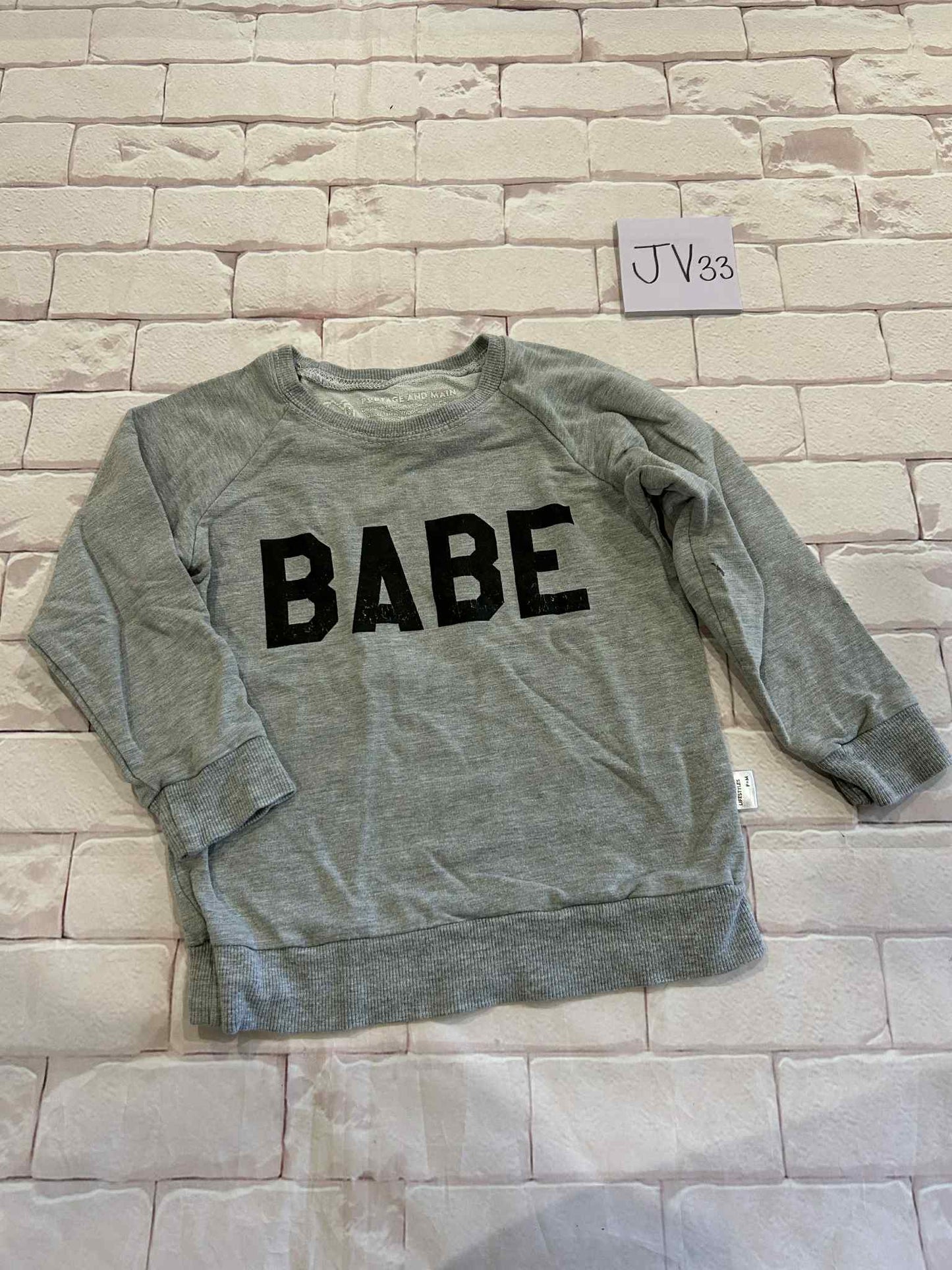 Tops Size 3/4 Cracking On Logo